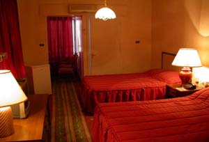 2 person king size suite with city view, balcony, private facilities (bath and shower), and breakfast